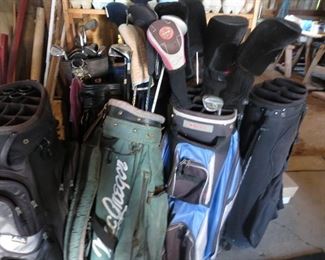 Golf bags and clubs