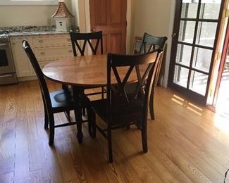 GORGEOUS dining room set-this is in with 4 chairs and the next photo is with 6 chairs and two leaves.  It is fabulous