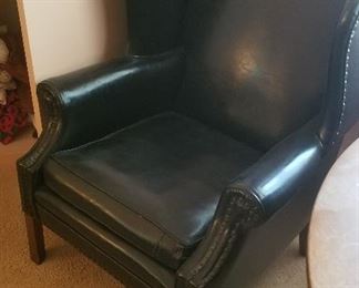 Black leather wing chair