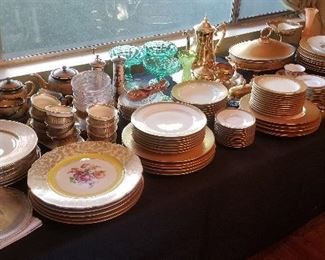 Great assortment of gold rimmed fine china by various companies