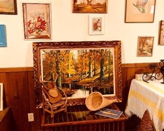 Vintage frames art prints, glass top wood spindle coffee table 