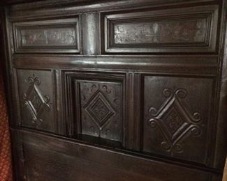17th Century Jacobean bed made of virgin oak with inlaid mahogany panels (The small ledge is for your knife.)
