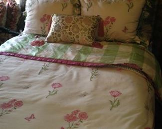 Darling custom bedding for a full bed complete with padded headboard