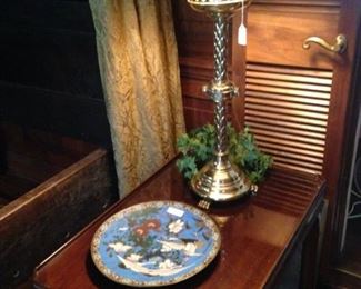 One of two side tables; one of four unique brass altar candlestick lamps with custom silk shades