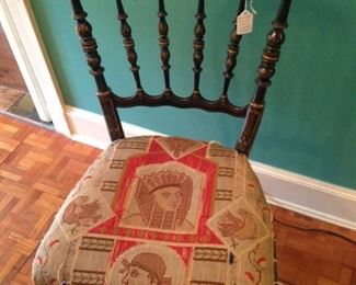 One of four ballroom chairs with Egyptian style needlepoint seats (as is)