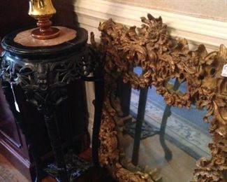 Ornate gold mirror; one of two matching marble top plant stands