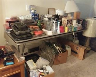 cookie sheets, bake ware, vases, crystal, lamps, grabbing stick, mixer, bag sealer, electric knives, paper products, cleaning products