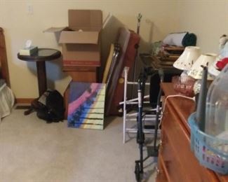 shoe rack, rubbermaid containers, candles in all sizes