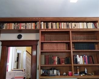 Nice library. Mixture of paperbacks to vintage leather bound.