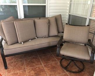 Outside metal sofa and swivel chair