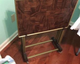 TV trays. These are light weight and on rollers.