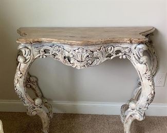 Ornate wood console table with marble top...