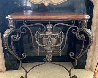 Wall mount ornate console table with leather top
