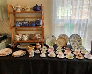 A nice collection of antique tea cups/ tea pots and plares