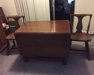 Abernathy Furniture Company dining room set. 85-90 years old, dark walnut.  Matching dining room table with 4 chairs.