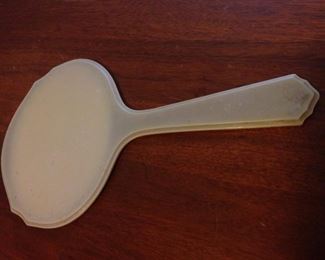 100 year old beveled hand mirror. Celluloid/Xylonite ivory-colored handle.