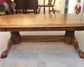 Large oval solid oak coffee table.