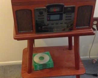 Crosley radio/entertainment center with stand.