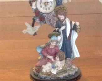 Mary, Joseph, and Baby Jesus clock with moving parts.