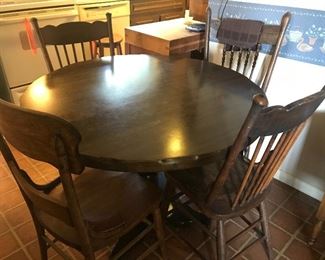 Dining room table and antique chairs