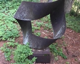 Outdoor weathered steel garden sculpture