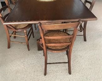 Hand crafted trestle table and 6 antique chairs