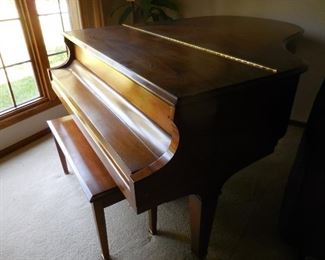 1986 Baldwin 65-inch Grand Piano and bench in walnut finish