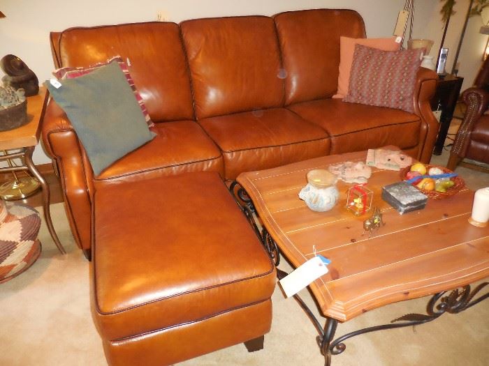Beautiful leather sofa and matching ottoman