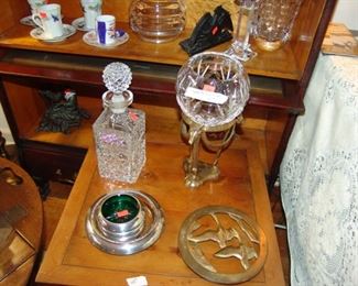Crystal decanter and crystal bowl on brass stand