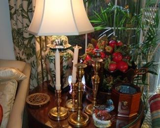Two sets of brass candlesticks and oriental lamp