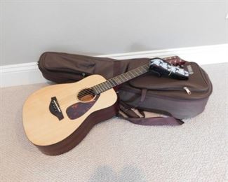 Yamaha F.G. Junior guitar with case and strap