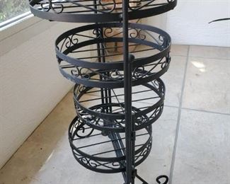 Plant Stand,,,,because...that's right, plants do not like to sit...Otherwise it would be called a Plant sit.