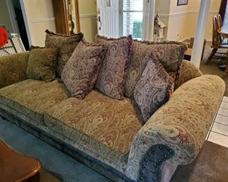 Couch. Very Comfortable. Don't tell the owners, but I took a nap on it the other day. Quite good sleep, I might add.