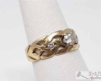 820: 	
14k Gold Ring with Center Diamond and Accent Diamonds, 3.8g
Weighs approx 3.8g, approx .5ct, size 7 
OS19-017630.79