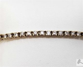 8601: 	
14k Gold Diamond Bracelet, 12.2g
Weighs approx 12.2g, measures approx 7.5" Bracelet is broken at clasp
OS19-017630.39 1/2