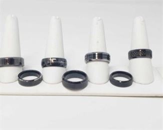 1011: 	
16 Metal Rings
16 Metal Rings weighing approx 86g sizing from approx 5.5 to 12.5. Some are Titanium and Tungsten Carbide
OS19-017630.43