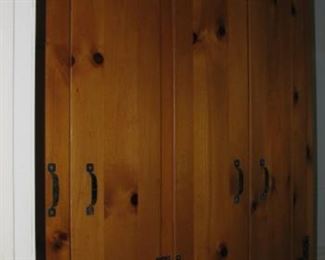 Knotty pine linen closet