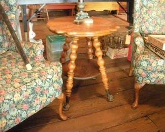 Ah, there is a closer look at the large glass ball and claw feet.