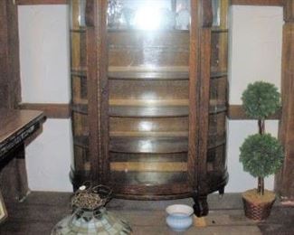 Large, extra wide, Antique Oak Curved Glass Curio Cabinet...guaranteed to hold a lot....smaller version also available.