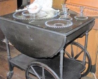 Tea Carts of all decades are back in vogue...this one has a drawer too.  Various pieces of Candlewick by the Imperial Glass Company, 1939.