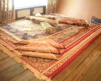 We stopped counting at 15 area rugs and carpets....very clean...measurements on the tags.