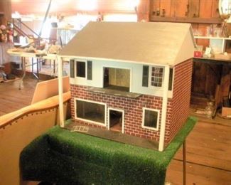 Our helper, Young Miss Abby loves this doll house and all the room furnishings....lawn carpet included. 