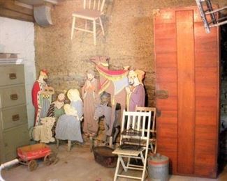 The large wooden cabinet is actually an old box to store a casket in....makes a great wardrobe when standing on it's end like in this photo.