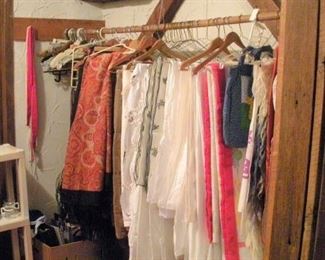 Table Cloths, Coverlets, Piano Scarfs, Curtains and Linens...1 of many closets and racks full....did you see the retro 1960's Funky Bell Bottom Pants?  (future photo)