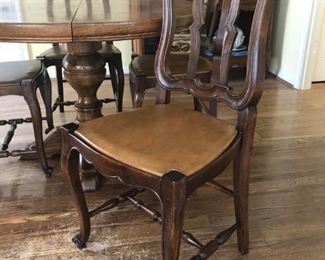 Early 20th century French dining chairs with leather upholstered seats