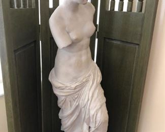 Reproduction Venus de Milo statue and green-painted three-panel room divider