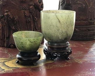 Chinese carved spinach jade cups on stands