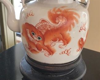 Vintage Chinese porcelain teapot with foo dogs motifs