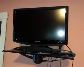 Sharp 19” flatscreen TV and wall shelf
