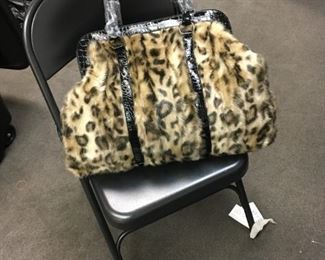 Need a fur designer bag? New.